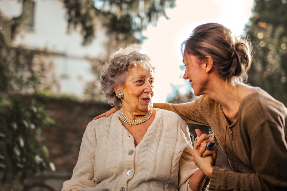 A young woman contemplating the aging process, representing the three biological waves of aging discovered in landmark research