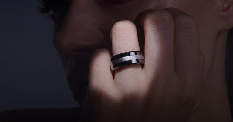 Official Vital Signals photo of a person wearing the Signal Ring on an index finger