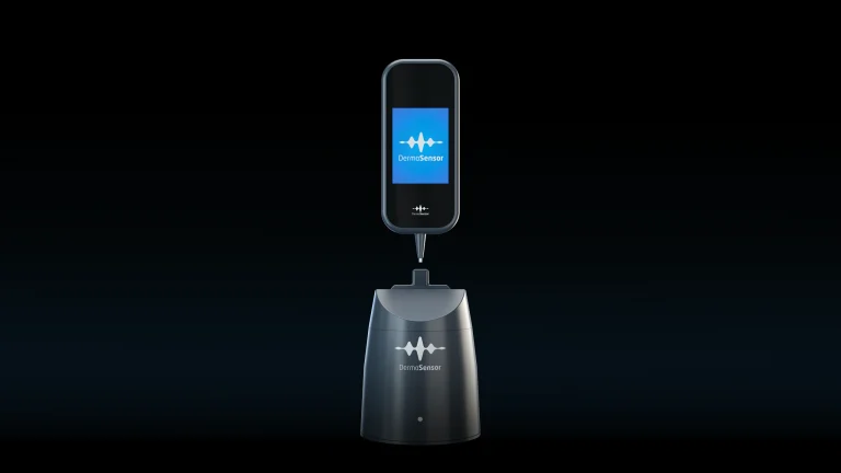 DermaSensor handheld AI skin cancer assessment device with charging dock